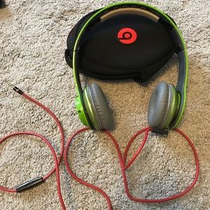 Lime green beats with wire